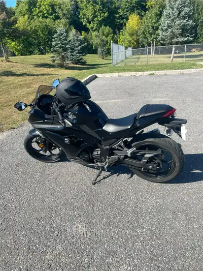 I am selling a black Kawasaki Ninja EX300 ABS, a sporty motorcycle perfect for both new and experien...