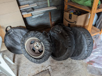 Used all season tires with rims and bags.