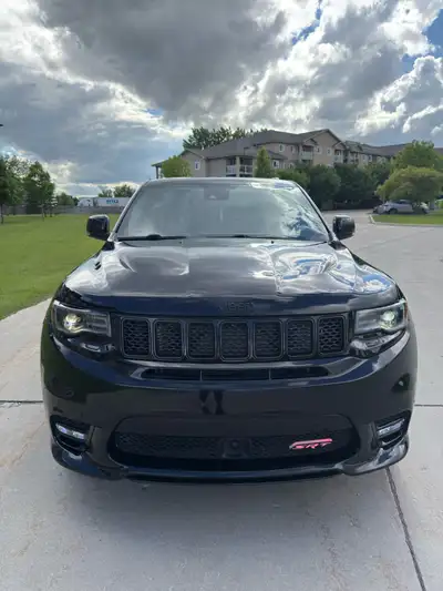 Selling My 2021 Jeep Grand Cherokee SRT 6.4L HEMI V8 - 475HP. Rebuilt title All parts replaced with...