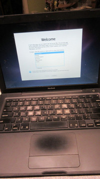 Black Apple Macbook 13.3in laptop Core 2 Duo OSX Windows