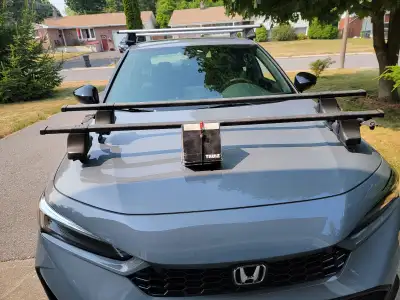 Thule roof racks; the feet were for a pre-2019 Mazda3
