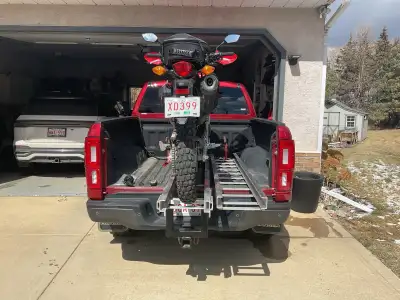 Powered motorcycle loader. Works excellent takes all the struggle and risk out of loading. Weight is...