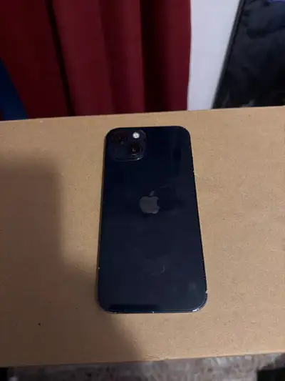 Midnight blue iPhone 13, slightly scratched screen around edges otherwise fully intact and working.
