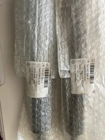 These VW Touareg tailgate struts, part number 7L6 827 550 N, are designed to provide reliable suppor...