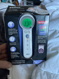  New in box Braun, no touch plus forehead thermometer