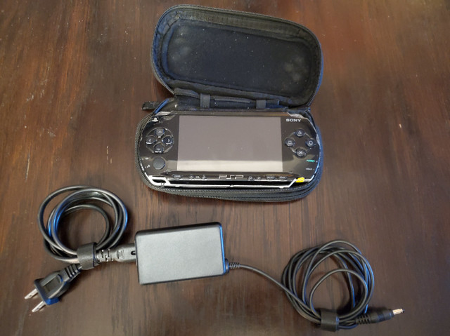PSP 1001 modded (6.20 PRO-B4) with case in Sony PSP & Vita in Grande Prairie