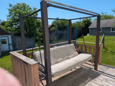Porch swing , it's in good condition. The cushion has a few little tears that can be easily fixed :)