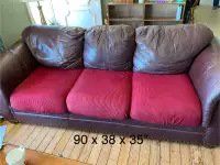 Distressed look leather sofa couch