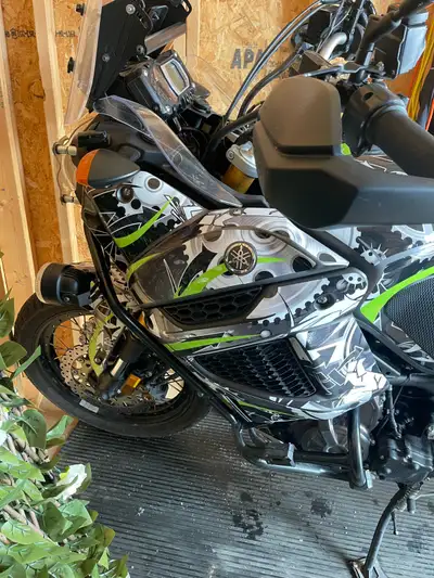 Very well looked after, always stored indoors, high quality wrap, steering lock, removable top box a...