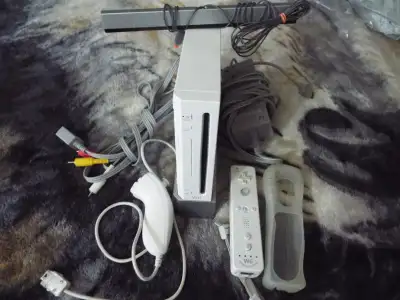 CONSOLE WII UNE MANETTE UNE NUNCHUK FILAGES ET JEUX, View more