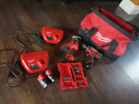 Milwaukee tool set.Drill,bits,tool bag, battery and charger