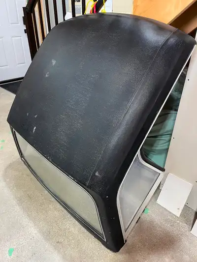 Rare Textured fiberglass hardtop for an MGB. This black hardtop features a rear glass window with la...