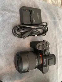 Sony A7III (572 actuations), 28-70mm lens, charger & camera bag