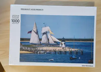 New in pkg. 1000 piece wood jigsaw puzzle. Size 30 x 20 inches. $5. Pick up is close to Inkster and...