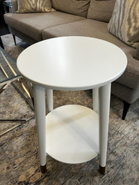 Elegant Pair of White Wooden Side Tables with Gold leg Trims.