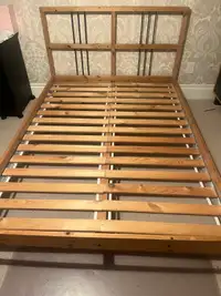 Double size wooden bed with free mattress $100