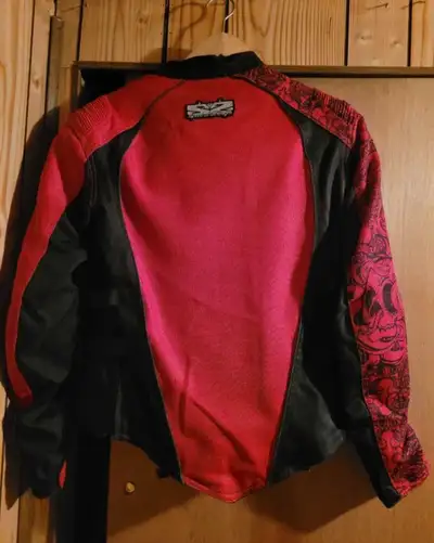 I'm offering a stylish and protective Ladies small motorcycle jacket, perfect for any female rider l...