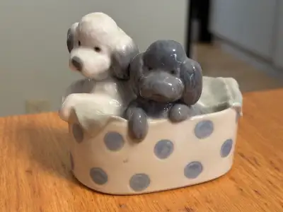 This gorgeous NAO 1082 Poodles and Dots in porcelain is sure to please. Features two cute puppies in...
