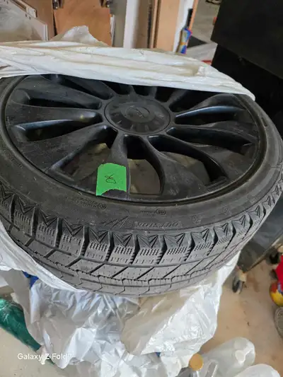 Tesla model Y 20 inch rims for sale with winter tires. 255 40 R20 tires size. Tires are just 30% but...