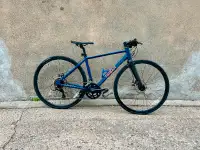 Triban Flat Bar Road Bike - RC 120. Size XS. FB Blue/Orange