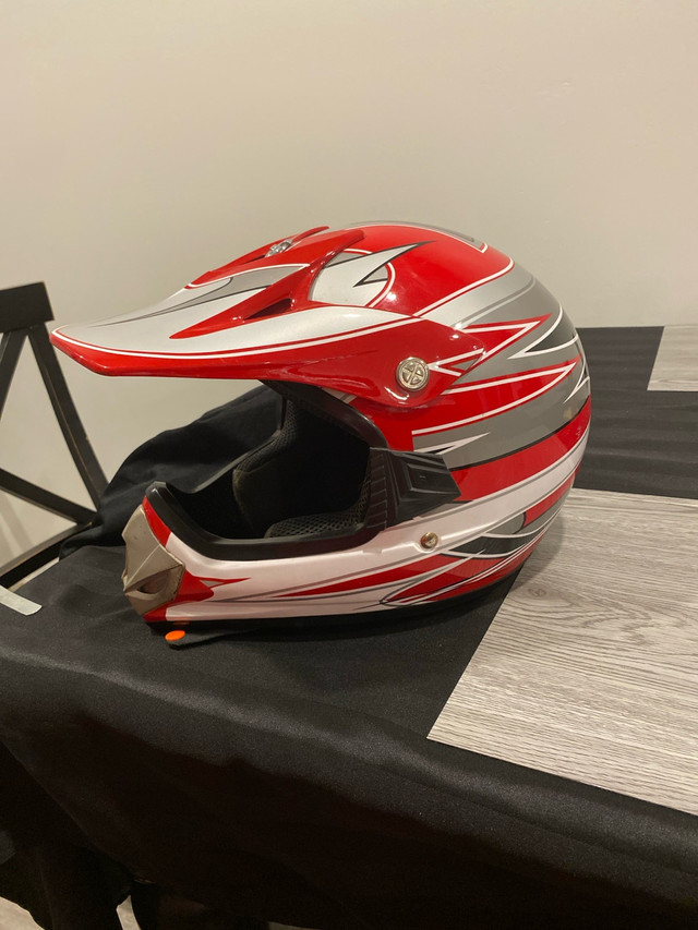 youth medium motocross helmet in Other in Kawartha Lakes