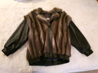 Never Used  Leather/fur vest/coat Size medium