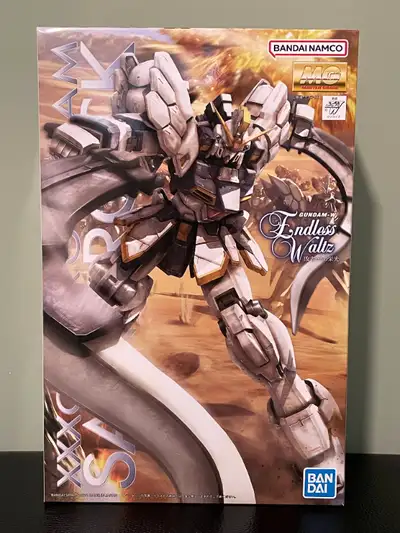 For sale is a brand new, factory-sealed Master Grade 1/100 Gundam Sandrock EW model kit. This iconic...