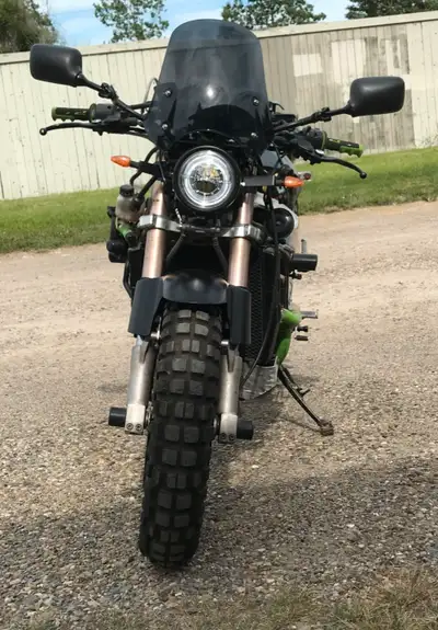 Customized 1994 Kawasaki ZX750, engine is from 96Ninja ZXR7R with 34.000 km, new black matte paint w...