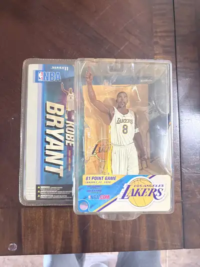 Own a piece of basketball history with this rare Kobe Bryant action figure! This collectible is from...