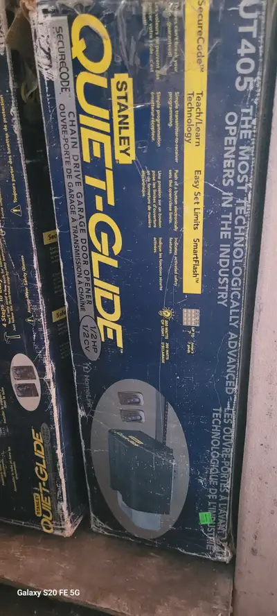 Garage door opener open box as is $80, View more