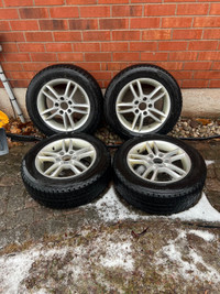 Set of OEM 16” BMW Rims On Bridgestone Winter Tires