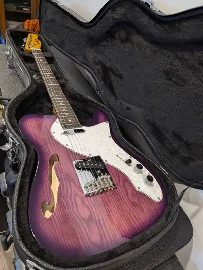Soulman thinline tele. Purple burst. Comes with hardshell case. Needs a set up. Have played it a few...