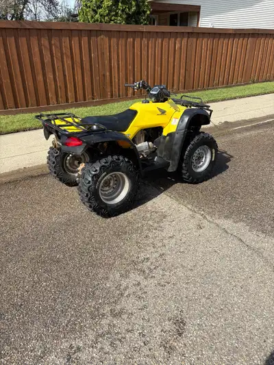 2004 Honda 350 rancher, 4x4, 3500 pound winch, new tires, electric and pull start Electronic shift a...