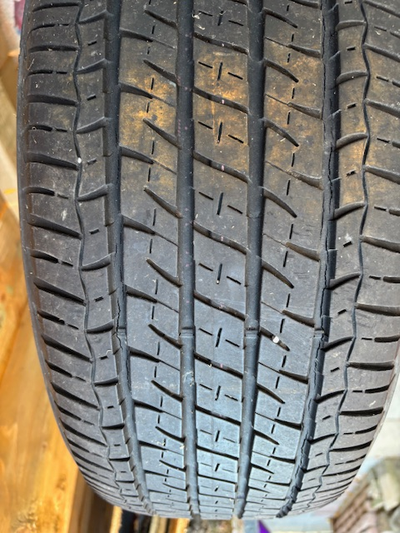 Firestone Champion ALL WEATHER tires. Tread depth is 2 @ 7/32 inch and 2 @ 6/32 inch- New is 11/32 i...