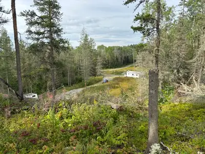 10 mins from Kirkland Lake, ON. Mobile home & trailer included as is. Off grid. Year round maintaine...