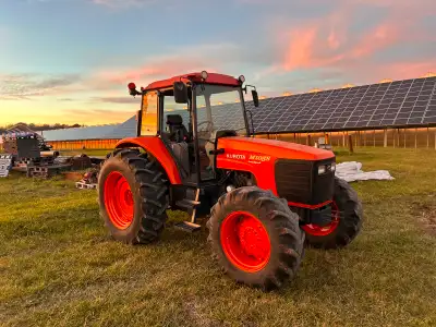 Kubota M105 Cab Tractor ,Diesel engine, 12 speed shuttle shift ready for pickup call Rick 5198198640
