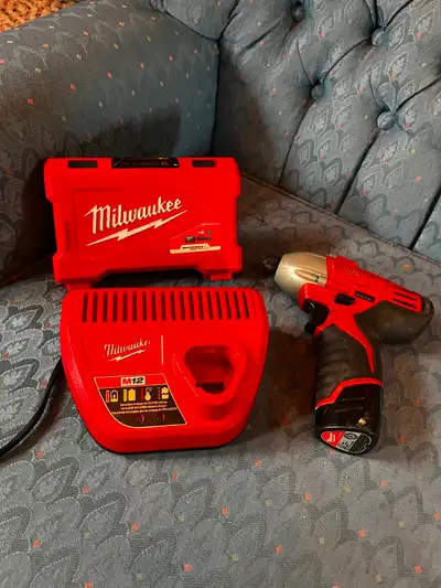 Milwaukee M12 Drill with charger and battery, View more