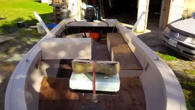 Good boat motor and trailer, no leaks , New beams and 5/8 pt floor, trailer in great shape with owne...