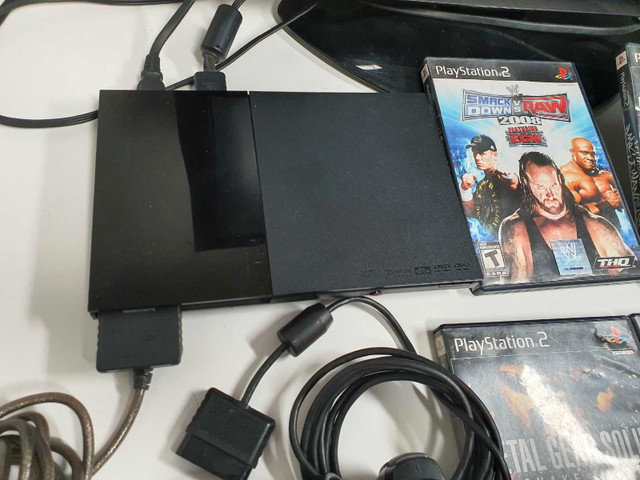 Sony PlayStation 2 slim,5 jeux,2 manettes,volant  dans Consoles classiques  à Ville de Montréal - Image 2