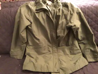 LL Bean rain jacket with hood. 100% polyster. As new. plus shipping.