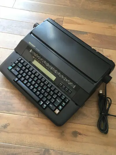 Rare find. Sharp portable electronic intelliwriter-plus (model PA-3140) in very good working conditi...
