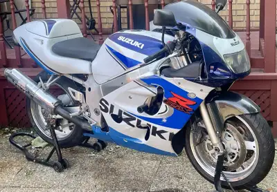 For sale is a used Suzuki GSX-R motorcycle, featuring a powerful engine and sporty design. It's read...