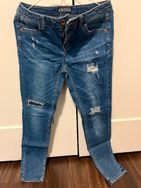 Women mid rise ripped jeans size 8