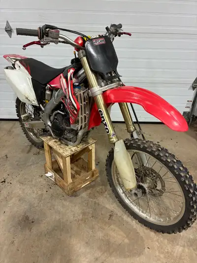 2005 Honda CRF 250 R just recently has had a full engine rebuild, roughly 2 hours of running time on...