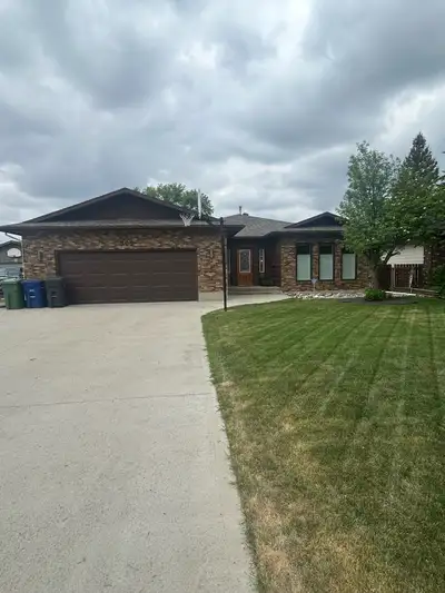 Home on Watson Crescent for Sale 1543 sq ft home with double attached and single detached garage/sho...