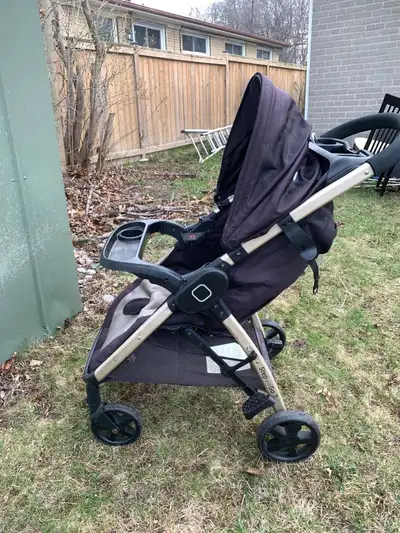 Black baby stroller, a little old.
