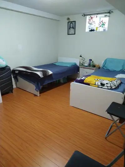 Room for rent on sharing with one girl This is 2 bed 1 bath basement Other room is occupied by 2 gir...