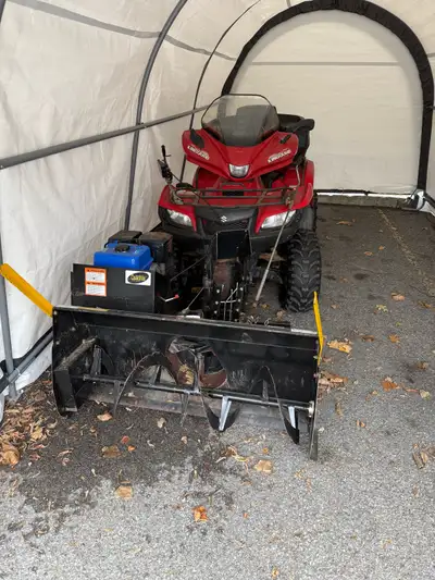 Selling a Suzuki King Quad four wheeler with blower attached. Machine is in good working order. Boug...