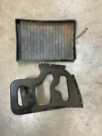 Steel battery tray - spot welds drilled to remove. Plus plastic battery tray. Good condition