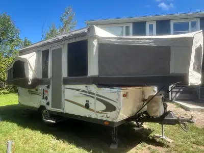 Great family trailer with a heater, electricity, hot water tank, propane stove, fridge and outdoor s...